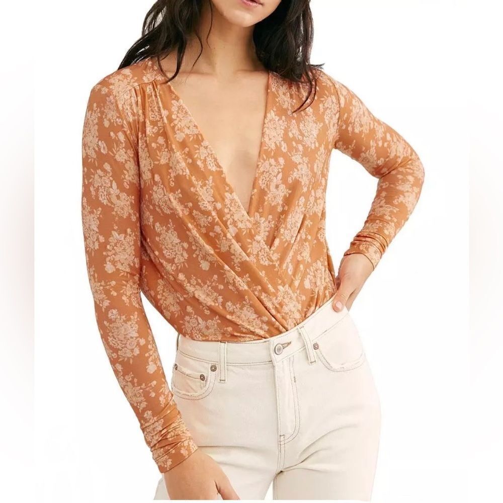 NWT-FREE PEOPLE Turnt Bodysuit 